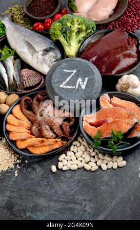 Food high in zinc on dark background. Healthy eating concept. Stock Photo