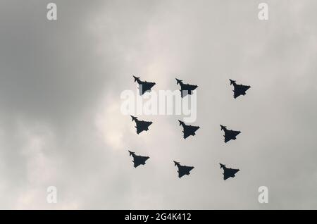 Royal Air Force Eurofighter Typhoon fighter jet planes flying in a diamond nine formation over Windsor Castle for Queen Elizabeth's Diamond Jubilee Stock Photo