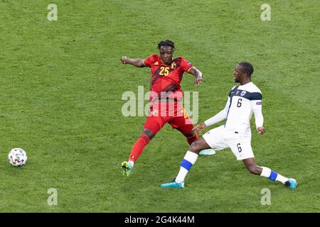 Jeremy Doku (L) and Glen Kamara (R) during the UEFA Euro 2020 Championship Group B match between Finland and Belgium at Saint Petersburg Stadium on June 21, 2021 in Saint Petersburg, Russia Stock Photo