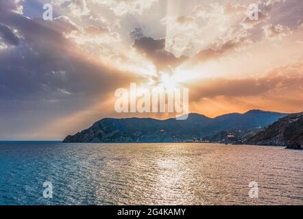 Dramatic sunset over the coastline of Cinque Terre, Corniglia, Italy Stock Photo
