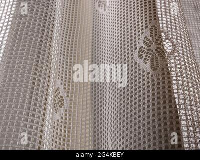 Pattern on curtain in gray autumn light Stock Photo