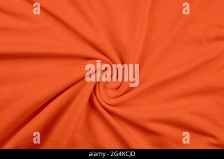 Background from orange monochrome cotton fabric. Close up texture Stock Photo
