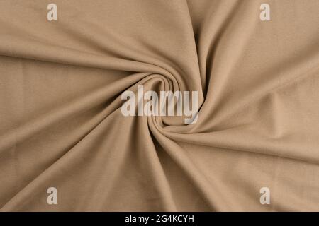 Background from beige monochrome cotton fabric. Close up texture Stock Photo