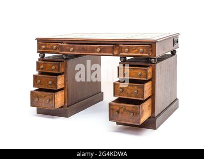 Old renovated desk with opened drawers and steel balls Stock Photo