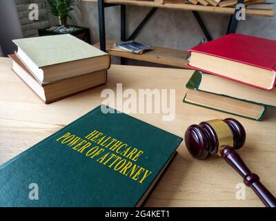 Healthcare Power of Attorney HCPOA guide and gavel. Stock Photo