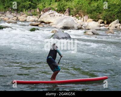 BARINAS, VENEZUELA - Apr 18, 2021: enjoy a rafting and padle surf in an unforgettable adventure on a mighty river Stock Photo