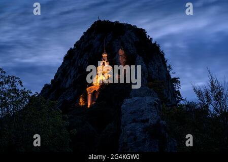 Troballa Cave (finding cave where was found the virgin) in the Queralt Sanctuary in the twilight blue hour (Berguedà, Barcelona, Catalonia, Spain) Stock Photo