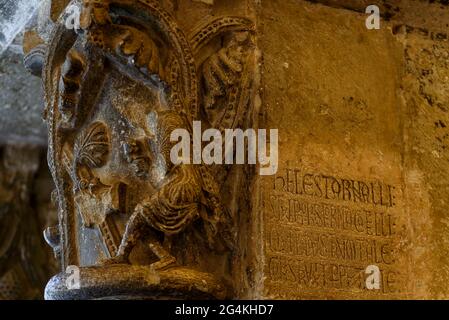 Unique capital in southern Europe that represents the office of the author Arnau Cadell and his signature. Monastery of Sant Cugat del Vallès (Spain) Stock Photo