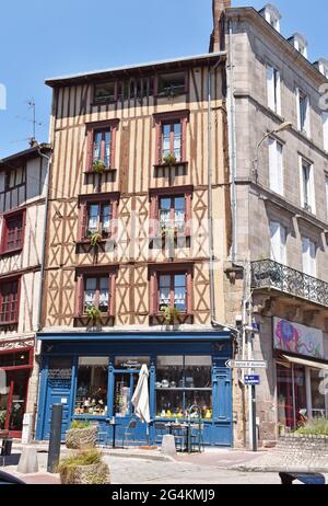 Restored medieval houses in rue de la Boucherie, in Limoges, France, the former shambles, butchers quarter, now occupied by restaurants, boutiques etc Stock Photo
