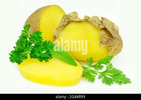 Cooked and cooled potatoes in the skin and parsley with coriander Stock Photo