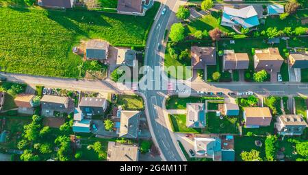 Aerial view of a modern urban intersection at night with contemporary ...