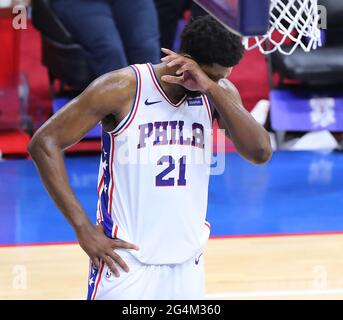 Philadelphia, USA. 20th June, 2021. Philadelphia 76ers center Joel Embiid reacts in the final seconds of a 103-96 loss to the Atlanta Hawks in game seven of their NBA Eastern Conference semifinals series on Sunday, June 20, 2021, in Philadelphia. (Photo by Curtis Compton/Atlanta Journal-Constitution/TNS/Sipa USA) Credit: Sipa USA/Alamy Live News Stock Photo