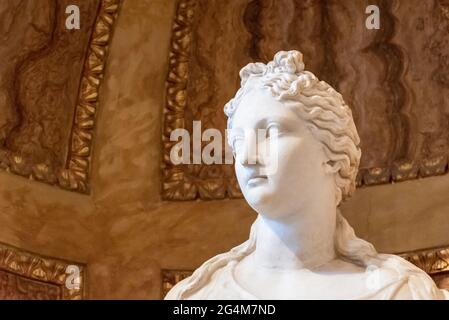 Close-up on face of marble italian statue representing a beautiful young girl Stock Photo