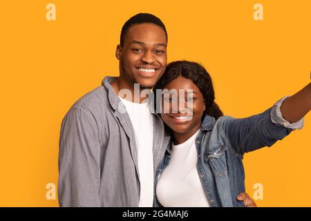 Closeup Of Positive African American Lovers Taking Selfie Together Stock Photo