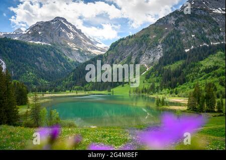 idyllic Lake Lauenensee with Wildhorn in spring, Bernese Alps, Switzerland Stock Photo