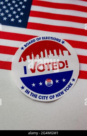 2021 Primary Election, I Voted Sticker and American Flag, NYC, USA Stock Photo