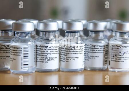 London, UK. 17th June, 2021. Pfizer Covid-19 vaccine vials seen displayed on a table at a vaccination centre. Credit: Dinendra Haria/SOPA Images/ZUMA Wire/Alamy Live News Stock Photo