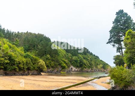 The beach of the Ea municipality near Lekeitio, Bay of Biscay in the Cantabrian Sea. Basque Country Stock Photo