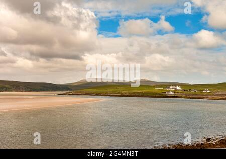 DURNESS SUTHERLAND SCOTLAND LOOKING ACROSS THE KYLE OF DURNESS TOWARDS KEOLDALE AND CAPE WRATH LODGE IN EARLY SUMMER Stock Photo