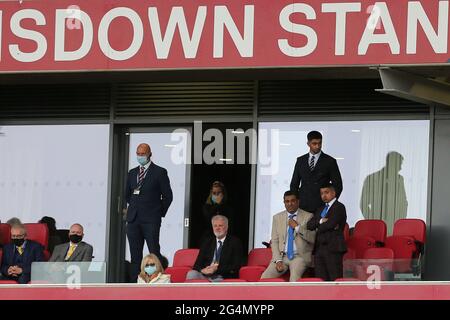 BRISTOL, UK JUNE 20TH Hartlepool United Chairman Raj Singh (seated Centre), his sons (standing right and centre) and former Middlesbrough, Manchester United and England footballer Gary Pallister look on from the directors box during the Vanarama National League Play Off Final between Hartlepool United and Torquay United at Ashton Gate, Bristol on Sunday 20th June 2021. (Credit: Mark Fletcher | MI News) Credit: MI News & Sport /Alamy Live News Stock Photo