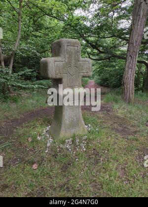 Vertical shot of a replica of a destroyed historical cross captured in Carlsbad, Czech Republic Stock Photo
