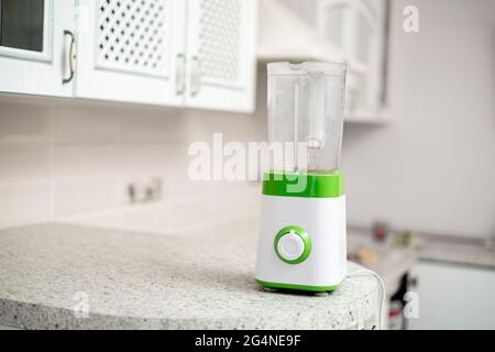 a simple abstract blender on the shelf table at home kitchen, making ...
