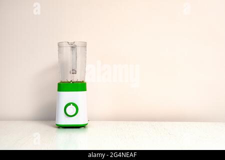 a simple abstract blender on the shelf table at home kitchen, making ...
