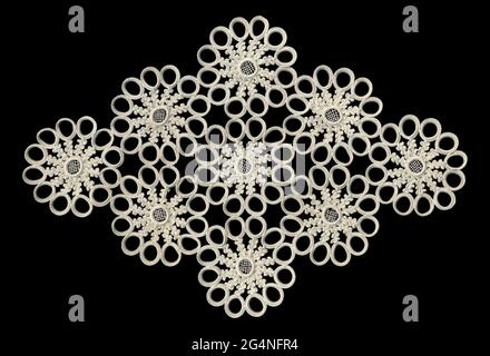 Handmade white decorative vintage lace pattern, isolated on black background