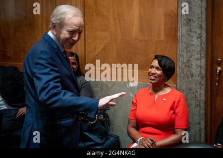 Washington, United States Of America. 22nd June, 2021. Former United States Senator Joseph I. Lieberman (Independent of Connecticut), left, is greeted by Mayor Muriel Bowser (Democrat of the District of Columbia) as they arrive for a Senate Committee on Homeland Security and Governmental Affairs hearing to examine D.C. statehood, in the Dirksen Senate Office Building in Washington, DC, Tuesday, June 22, 2021. Credit: Rod Lamkey/CNP/Sipa USA Credit: Sipa USA/Alamy Live News Stock Photo