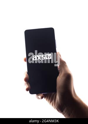 AXS TV logo on phone screen stock image. Stock Photo