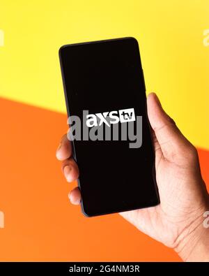 AXS TV logo on phone screen stock image. Stock Photo