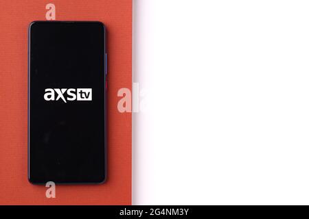 AXS TV logo on phone screen stock image. Stock Photo