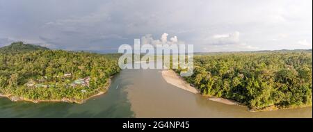 Aerial overlooking Rio Napo  above Misahualli village, a popular destination for adventure tourism in the Ecuadorian Amazon. The clear water Rio Misah Stock Photo
