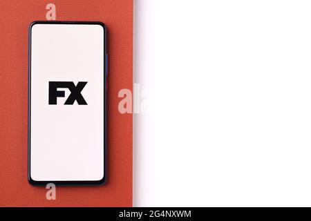 FX tv logo on phone screen stock image. Stock Photo