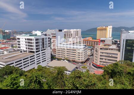 Kota Kinabalu, Malaysia - March 17, 2019: Aerial cityscape view with modern office buildings and hotels Stock Photo