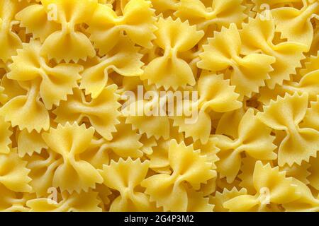 Close Up of Bow Tie Pasta Background Texture. Stock Photo