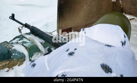 Moscow, Russia. 7th Feb, 2018. A sniper at a firing position is preparing to fire during a sniper training class.Russian Guard special forces snipers train at a closed training center. Credit: Mihail Siergiejevicz/SOPA Images/ZUMA Wire/Alamy Live News Stock Photo