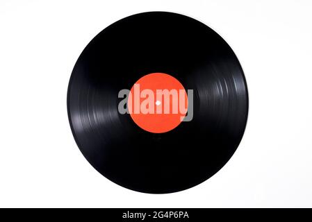 Old black vinyl records isolated on white background. with clipping path. Black vinyl record - vintage music play, with Red label Stock Photo