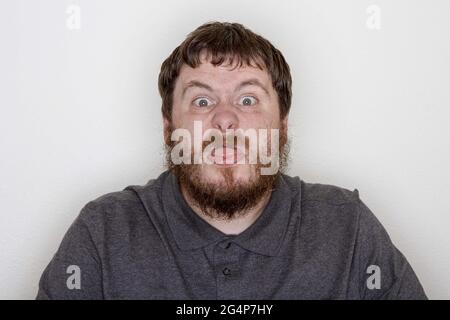 man lacks manners and is being offensive Stock Photo