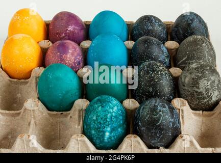 Multi-colored chicken eggs. Feast of Light Easter. Background. Stock Photo