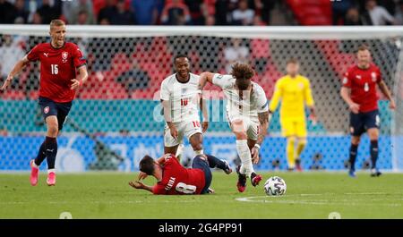 London, Britain. 22nd June, 2021. England's Kalvin Phillips (C) vies with Czech Republic's Vladimir Darida (bottom) during the Group D match between England and the Czech Republic at the UEFA EURO 2020 in London, Britain, on June 22, 2021. Credit: Han Yan/Xinhua/Alamy Live News Stock Photo