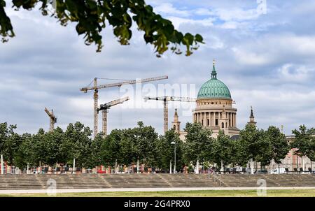 Potsdam, Germany. 22nd June, 2021. View from the Lustgarten to the Nikolaikirche at the Alter Markt and the construction cranes of the large building site in front of it. Credit: Jens Kalaene/dpa-Zentralbild/ZB/dpa/Alamy Live News Stock Photo