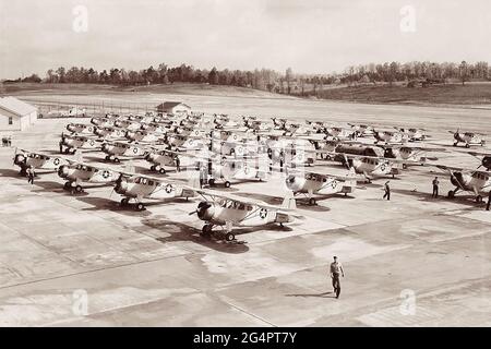 World War II training aircraft staged on the tarmac of the Atlanta Naval Air Station – the current site of Peachtree-Dekalb Airport in Chamblee, Georgia. (Photo: April 15, 1944) Stock Photo