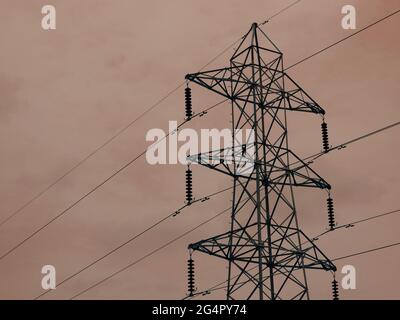 Electric supply tower isolate on sky background, Industrial presentation concept. Stock Photo