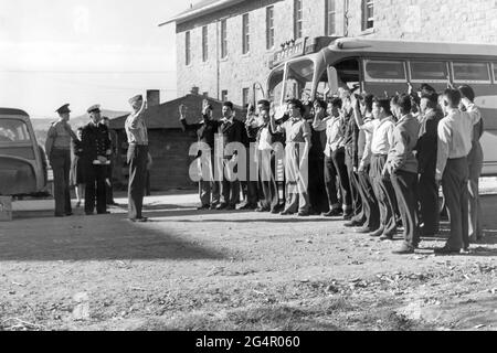 First 29 Navajo soldiers to serve as Code Talkers during World War II being sworn into the U.S. Marine Corps at Fort Wingate, New Mexico on May 4, 1942. Stock Photo