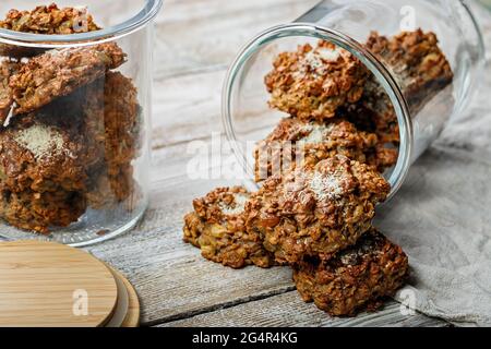 Homemade healthy gluten-free oatmeal cookies. Healthy food or fitness snack. Oats, isolated milk proteins, dried fruits. Sugarless. Weight control and Stock Photo