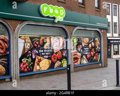 Food Plus, a Polish convenience store in the town centre, Northampton, UK Stock Photo