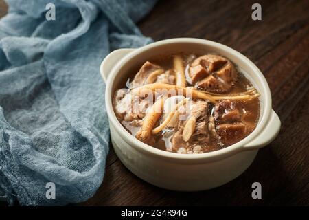 Mushrooms and astragalus codonopsis pilosula stewed pig bone soup Stock Photo