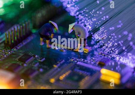 Busy workers ideas on printed circuit boards Stock Photo
