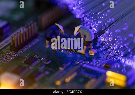 Busy workers ideas on printed circuit boards Stock Photo